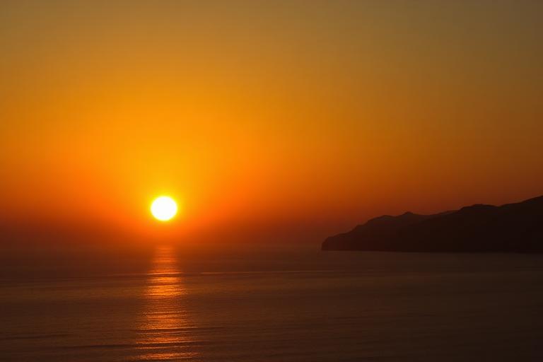 Golden sunset over a calm sea